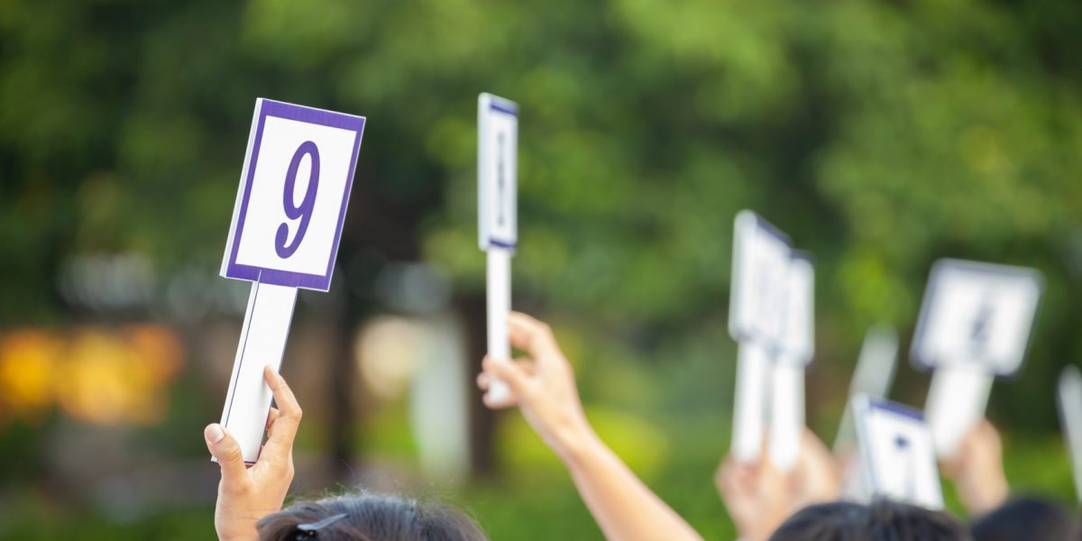 people at an auction